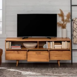 Cara Mid-Century Modern 3 Drawer TV Stand For TVs Up To 65" - Saracina Home 33 Cara Mid-Century Modern 3 Drawer TV Stand For TVs Up To 65" - Saracina Home -Bedroom Furniture Store GUEST 6406604d 1ec4 4548 a085 d7d44d4bfcce